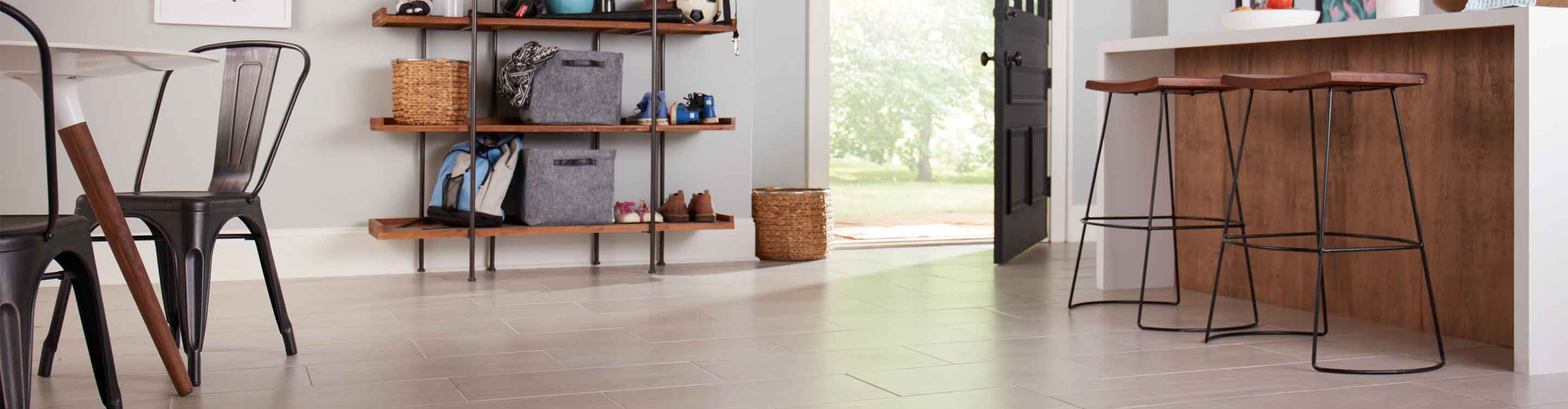 kitchen with tile flooring, kitchen counter and rustic wood accents